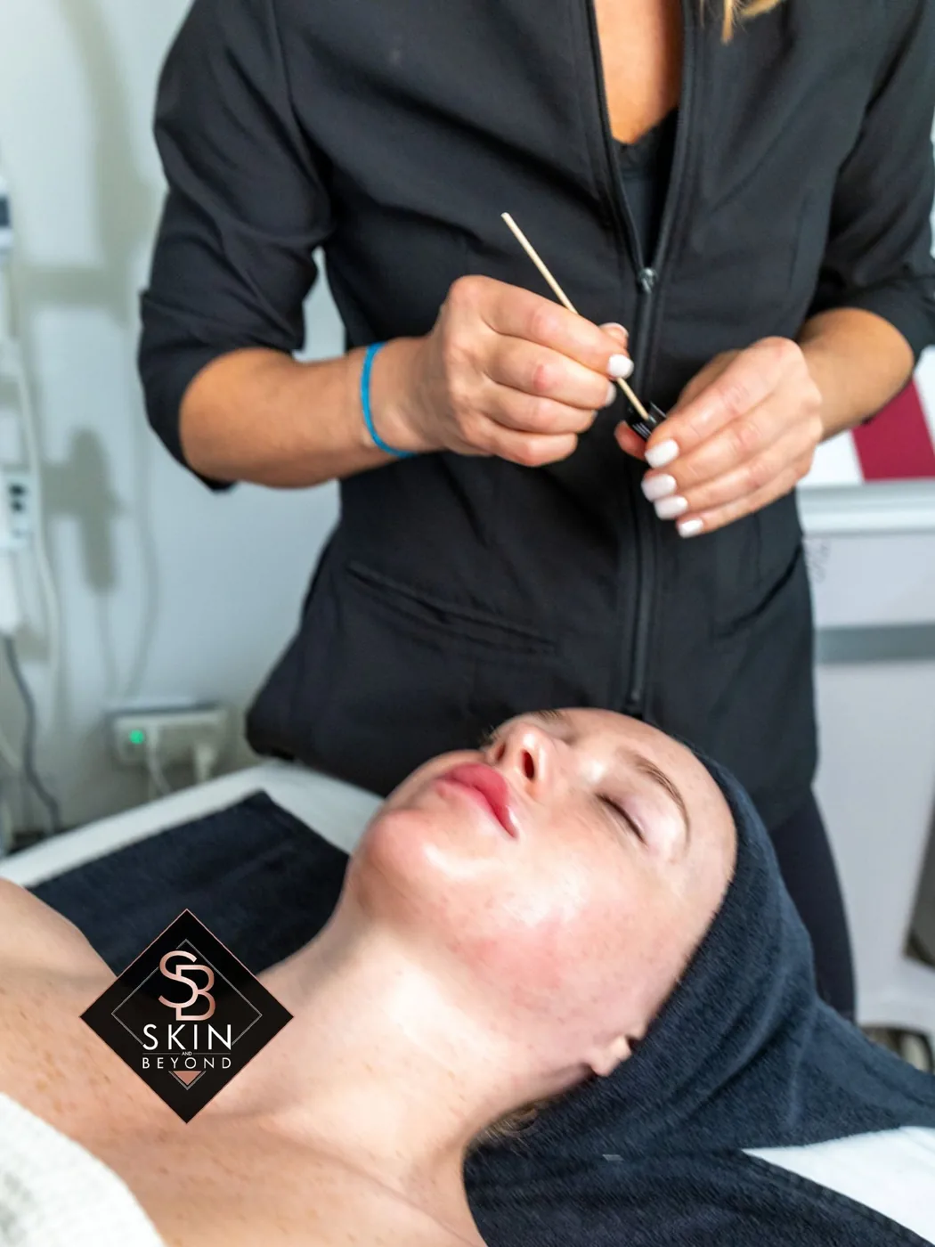 Facial treatment in progress at Skin and Beyond Spa